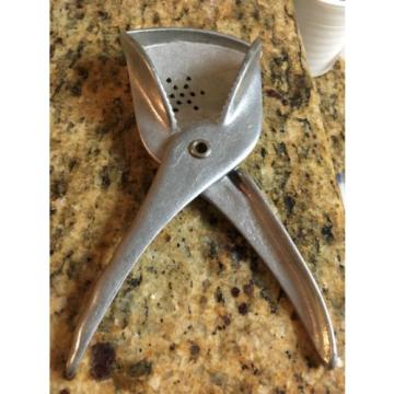 Weird large  GARLIC PRESS type thing?? , Kitchen Utensil Rival Mfg Co