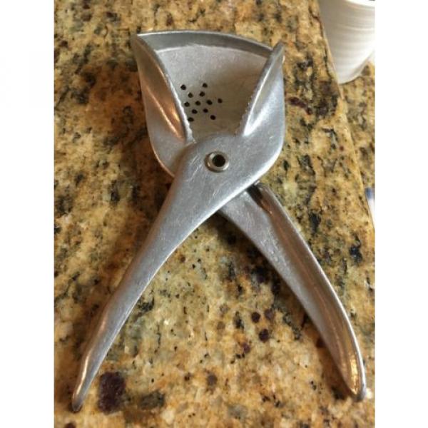 Weird large  GARLIC PRESS type thing?? , Kitchen Utensil Rival Mfg Co #1 image