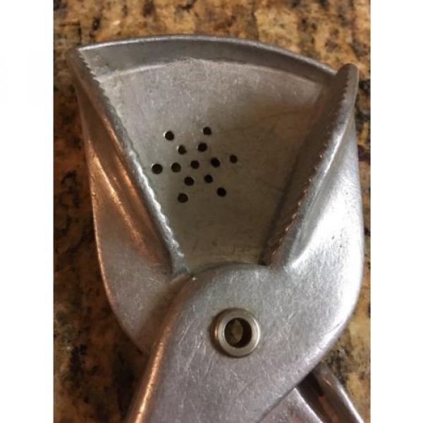 Weird large  GARLIC PRESS type thing?? , Kitchen Utensil Rival Mfg Co #2 image